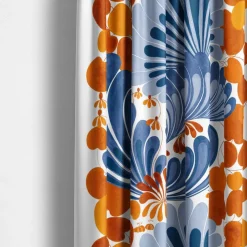 Lisette blå/orange gardiner - mönster i retrostil