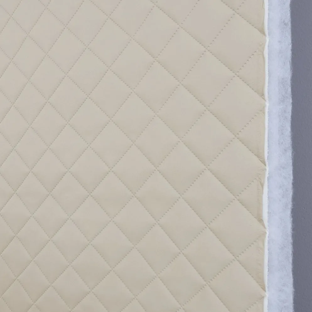 Niva XL ljusbeige fuskskinn